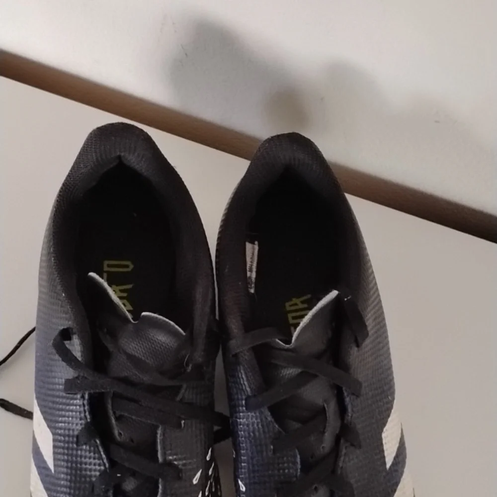 Adidas Black and Blue Cleats with White Stripes - Picture 7 of 8